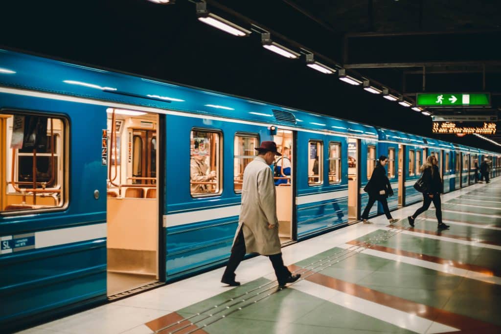 A man walking into a Montreal metro car. You'll need to know specific key phrases in French to take the Metro in Montreal.